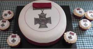 The commemoration cake and cupcakes decorated with an image of the Victoria Cross