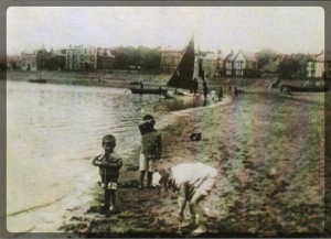 Parkgate shore, children playing, circa 1910.