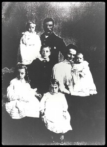The Bushell family expands. Clock wise from top left: Father Thomas with baby Jim , Reggie, Clara with baby Mollie, Eva, Lizzie. circa 1910 